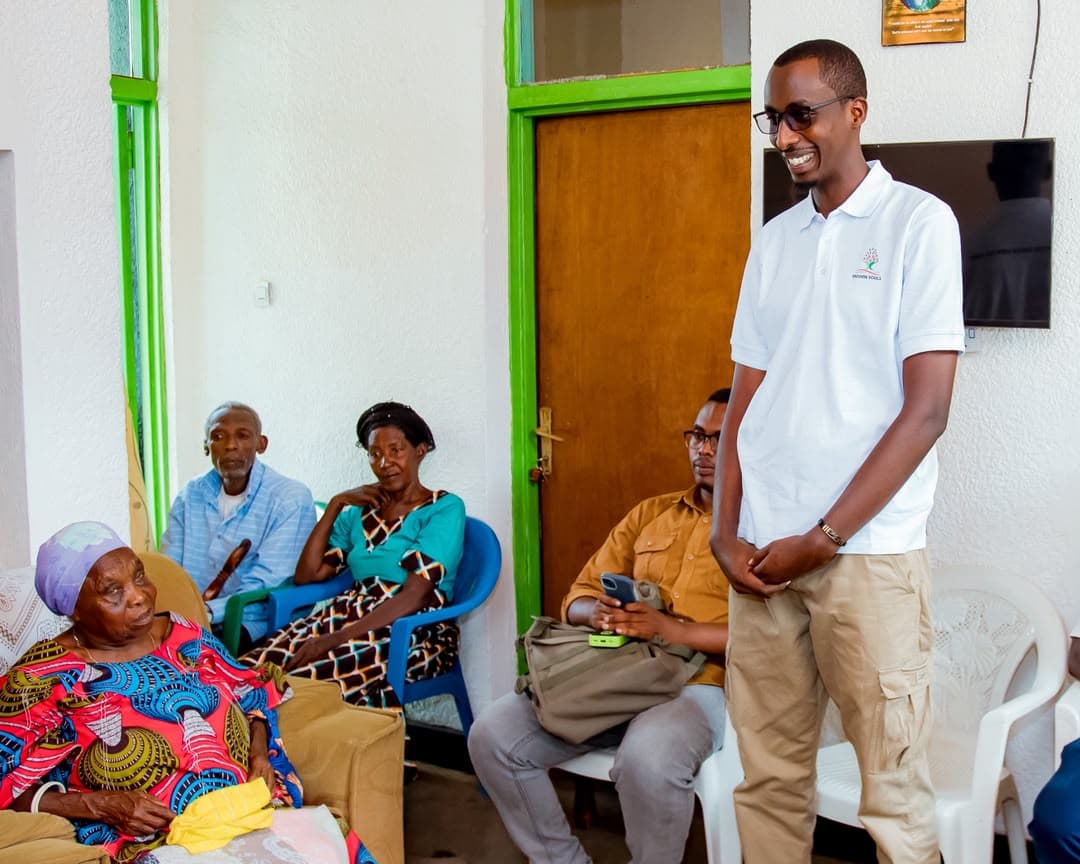 A Hidden Souls volunteer sharing a warm moment with elders at home